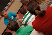 Students practice difficult dialogues in a classroom setting. 