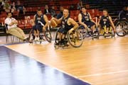 John Gilbert, a member of the Tiger Wheelchair Basketball Team, competes with the under-23 USA wheelchair basketball team in Paris.